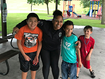 police officer with kids