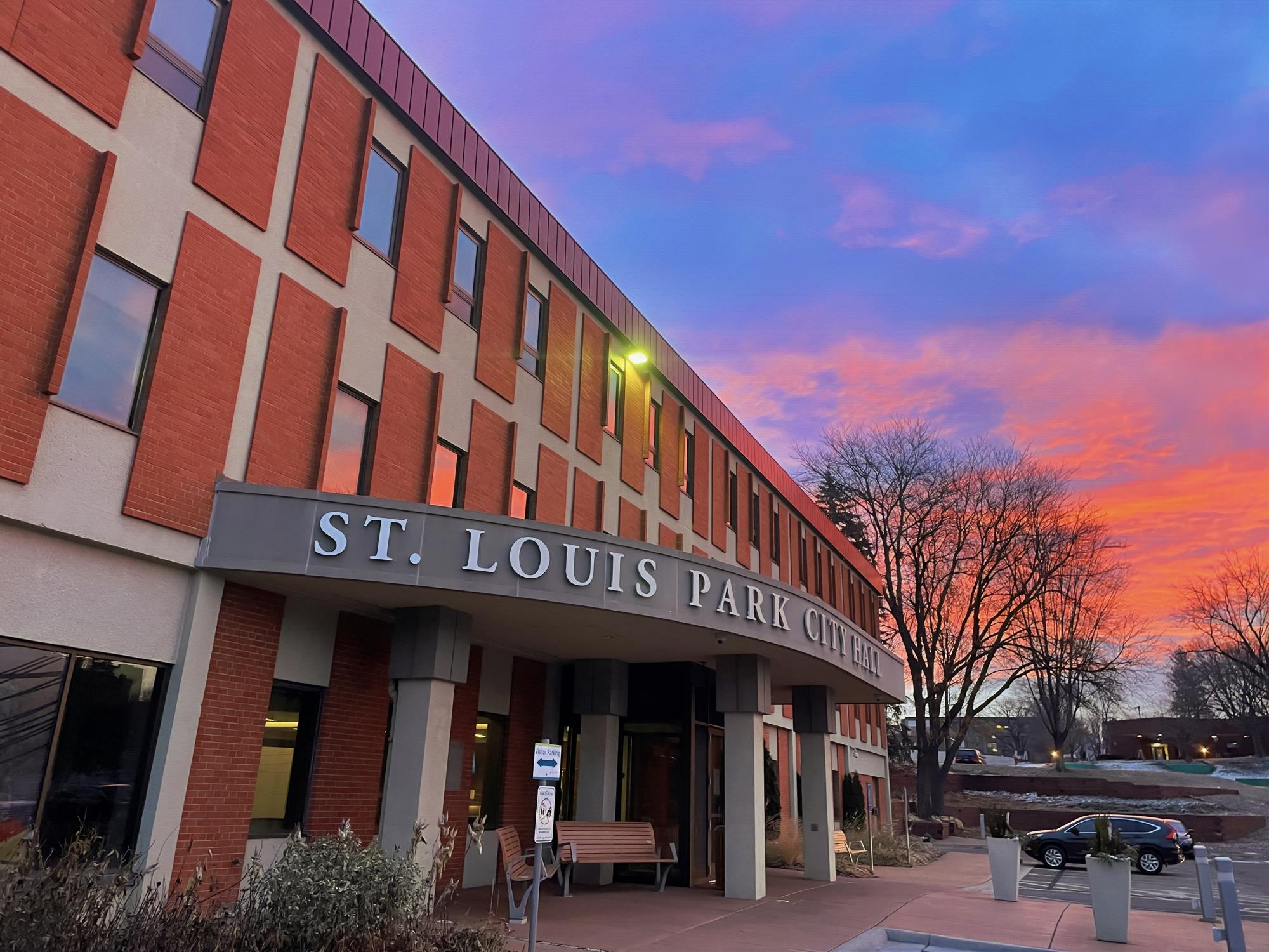 front entrance of city hall during sunset